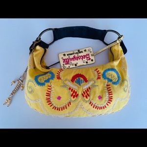 Betseyville colorful purse with cute skully charm